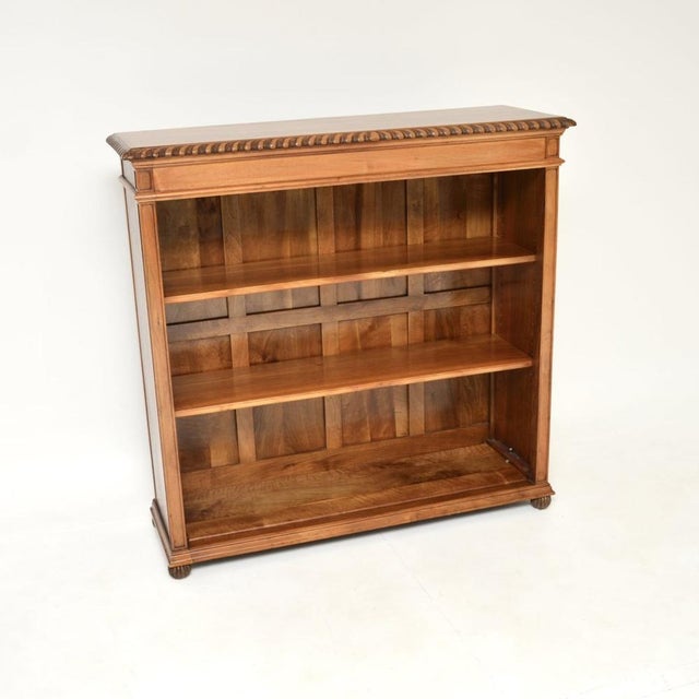 A lovely antique walnut open bookcase in the Victorian style. This was made in England, it dates from around the 1920’s....