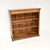 A lovely antique walnut open bookcase in the Victorian style. This was made in England, it dates from around the 1920’s....