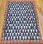 This Vintage Persian Kurdish Kilim Rug is in an all-over paisley (boteh) pattern. Hand-woven in wool, this room-size...