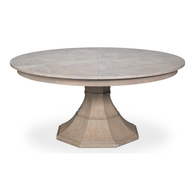 A softly gray, patterned top expands from 66 inches for six to 85 1/2 inches for ten, with leaves stored inside that swing...