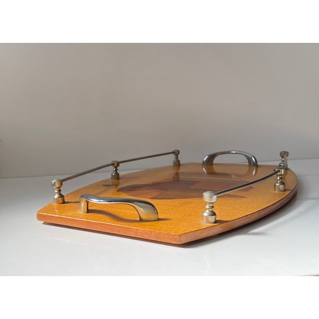 A large vintage and elegant tray from the 70s. The wood inlays shows Australia and the distribution areas of its most...