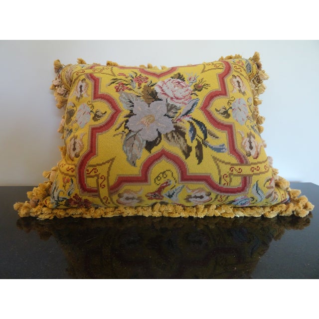 A very fine large needle point pillow with down insert. It has a great coordinating fringe