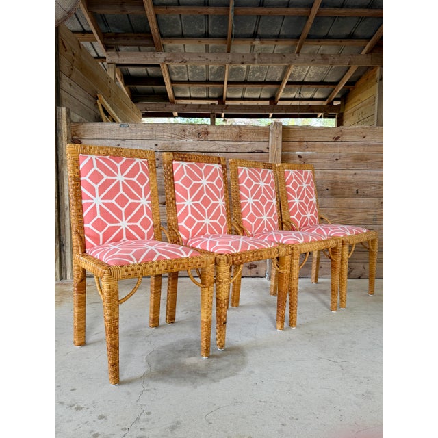 A stylish set of four vintage rattan dining chairs by the renowned Bielecky Brothers, celebrated for their exceptional...