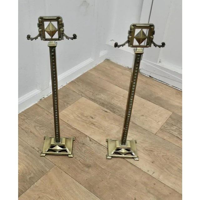 A Pair of Tall Victorian Brass Andirons or Tool Rests This very attractive pair of brass Andirons are 21” high, 4.5” long...