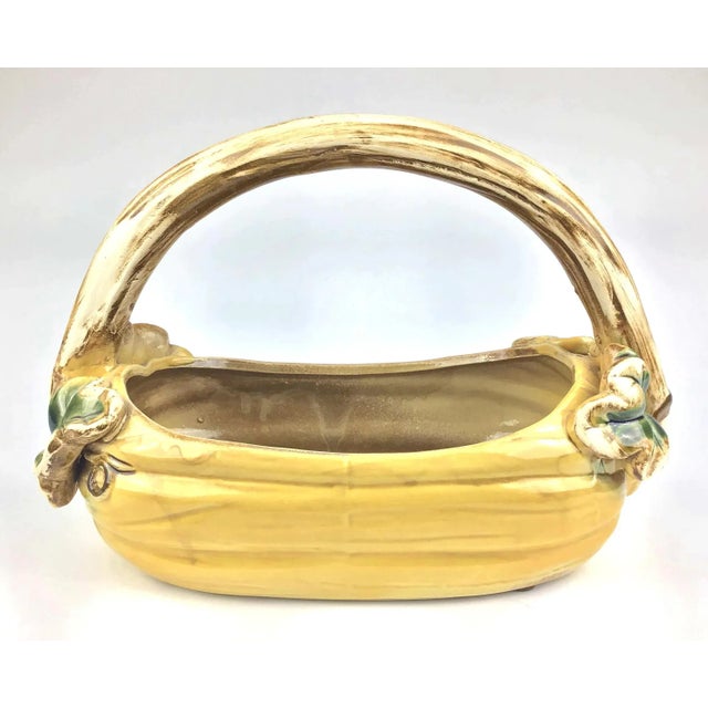 Unique design and elegant glazing. The colors are neutral to match your casual style. This basket can be a planter, serve...