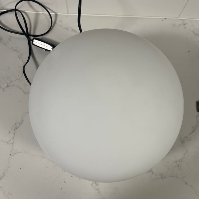 Modern Leucos Sphera table lamp. Matteo Thun designed Sphera in 2000 as a simple, slightly flattened oval shape that...