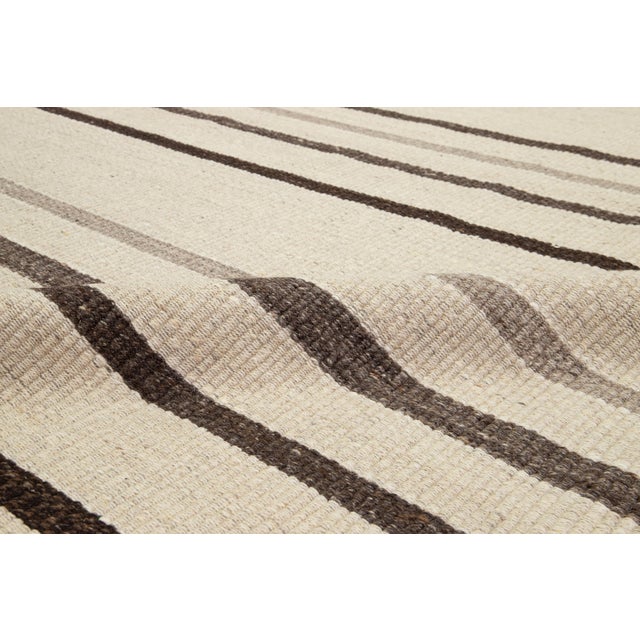 Organic Modern Flatweave Beige Wool Rug With Striped Design For Sale - Image 10 of 11