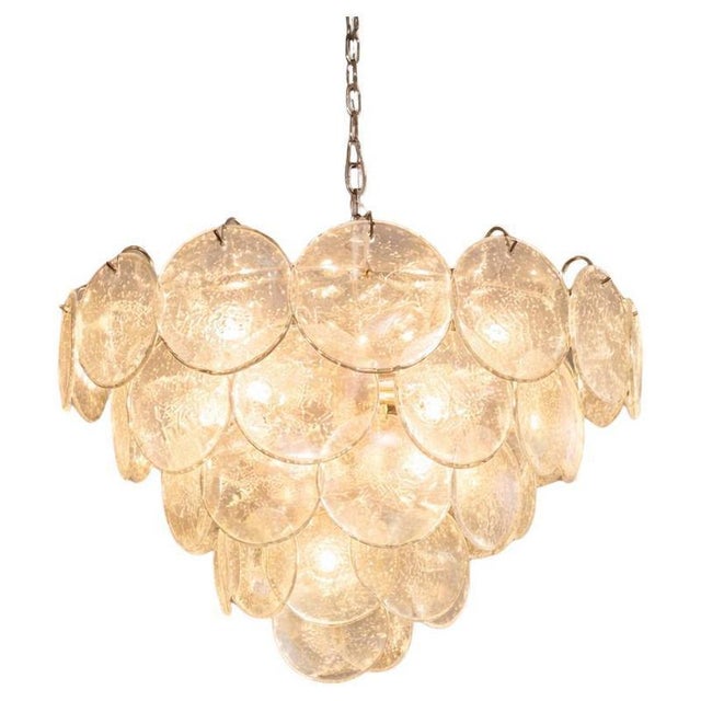 Pair italian murano chandeliers. Each chandelier has made 57 fantastic iridescent grit discs in a nickel metal frame\. The...