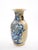 A beautifully crafted mid-20th-century Chinese porcelain vase, finely decorated in underglaze cobalt blue with elegant...