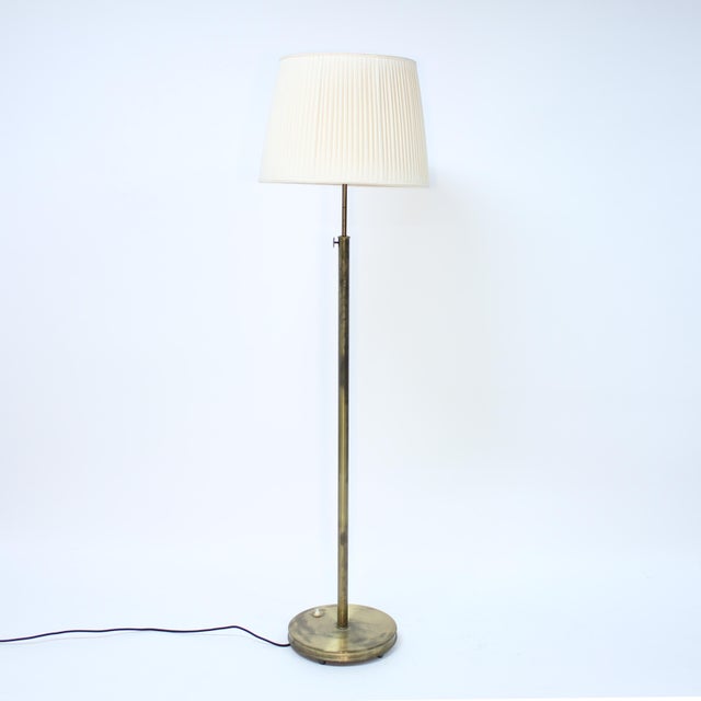 Very early example of the 2148 model floor lamp designed by Josef Frank for Svenskt Tenn in the 1934. This example is most...