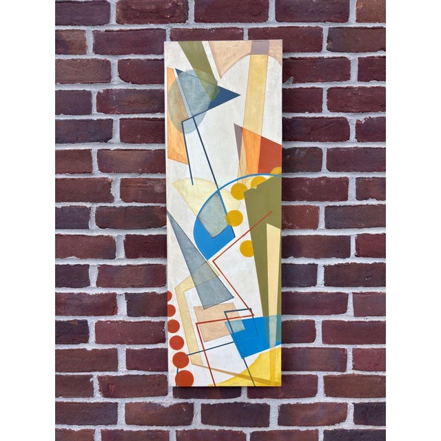This artwork features a dynamic interplay of geometric shapes and vibrant colors, creating an energetic yet balanced...