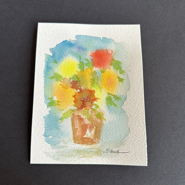 Bright flowers in terra cotta. Signed and ready to frame.