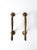 This is a pair of vintage brass door handles. The classic door pulls have a sweeping, sleek design with holes on the bases...