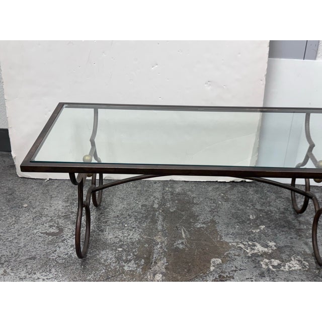 Design Plus Gallery presents a Wrought Iron Coffee in a Rustic European Style. The table base is heavy and sculpted with...