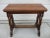 This wonderful bench with harp-like side supports has a slightly angled top seat. The surface of the seat is 25 inches by...