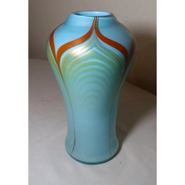 Up for sale is a stunning original signed Williams hand blown glass vase. It's blown by hand out of a gorgeous baby blue...