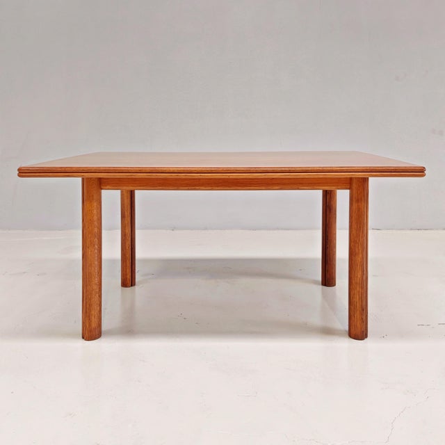 The table top has been newly restored while the cleaned and re-polished structure measures 146x100 H72 closed, 200x146 H72...