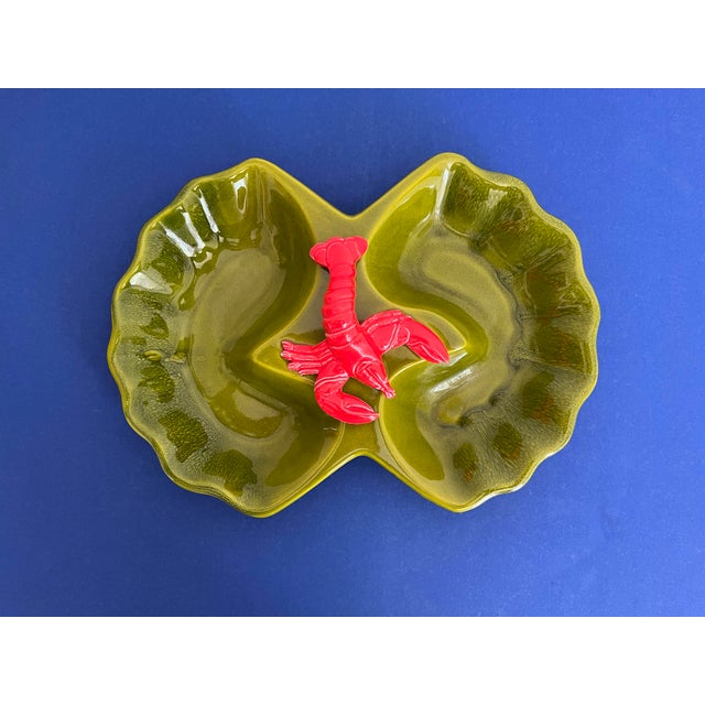 Absolutely gorgeous and large 1970s California Pottery serving tray featuring a saturated green drip glaze body with two...