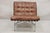 "New York" Brown Leather Lounge Chair by Katavolos Littell Kelley for Laverne. Item features a heavy steel frame and...