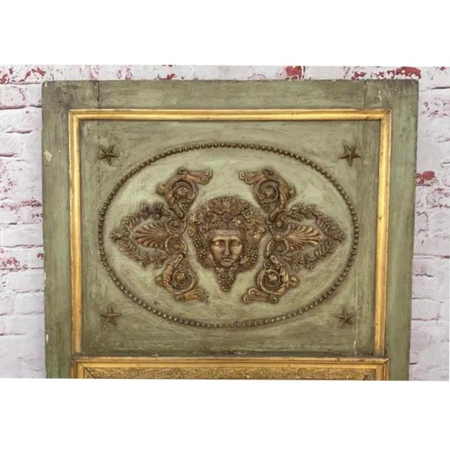 18th Century Antique French Neoclassical Trumeau Mirror in Painted and Gilt Wood. Mirror is painted in a soft, timeworn...