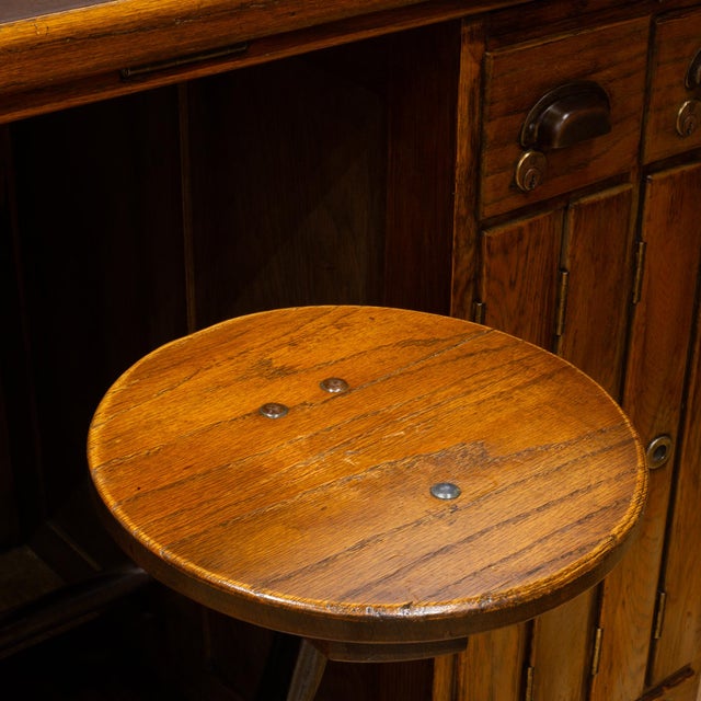Wood Antique Industrial Oak Architect's Desk With Integrated Swing-Out Stool c.1920 For Sale - Image 7 of 17