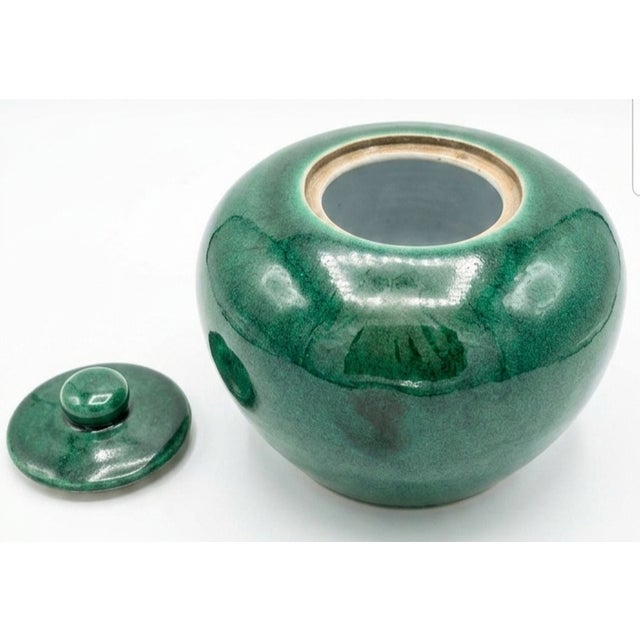 Rich, glossy emerald green monochrome glaze with subtle tonal variations with measurements of 9"x9"x8"