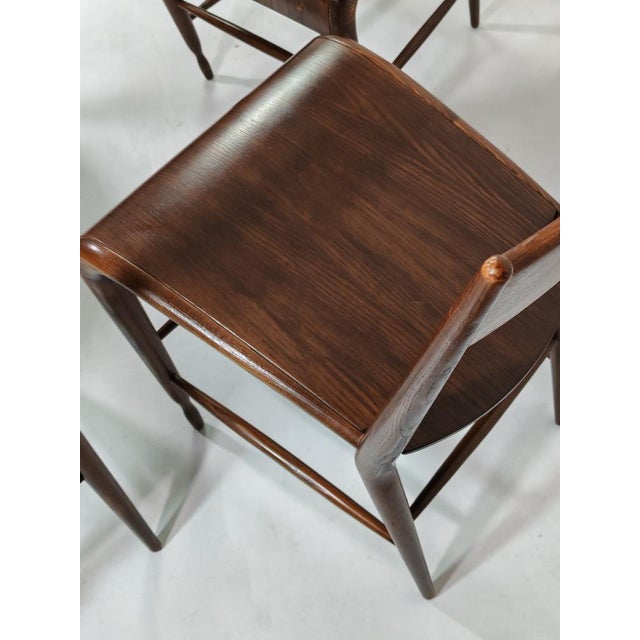 "Robin" Set of 4 Chairs Massimo Iosa Ghini prod. Calligaris Italy, 1989 Chestnut Wood Curved plywood veneered in chestnut...