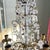 This is a beautiful French brass and crystal five-arm girandole candelabra with crystal swags and droplets adorning the...
