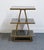 Contemporary Uttermost Grace Feyock Garrity Modern Glam 20" Gold Leaf Tiered Accent Table W. Black Glass Shelves Bar Table For Sale - Image 3 of 8