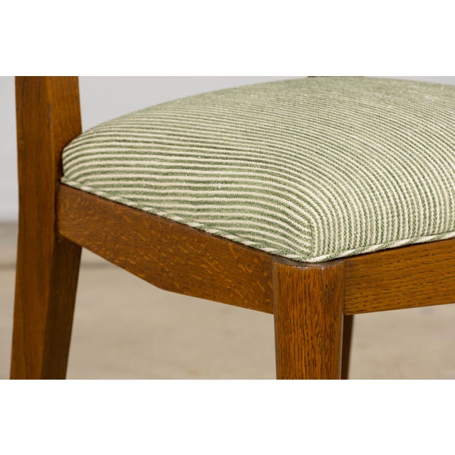 A refined set of six late 1930s French Art Deco dining chairs, sourced in Provence, defined by clean, architectural lines...