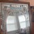 Windsor Arts Faux Stained Glass Mirror circa 1980. This mirror has a very pretty shimmery decoration in pink and green and...