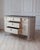 A Swedish sideboard inspired by 18th-century Baroque design, crafted in pine and finished in a softly aged cream paint...