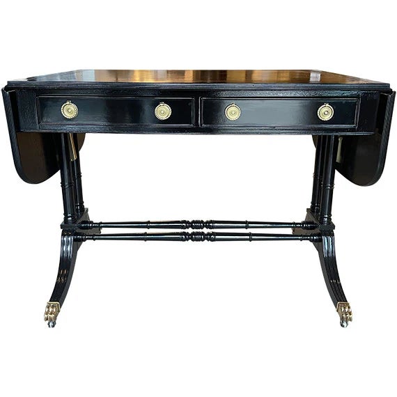 Elegant and substantial, this vintage dining table pairs a rich wood top with a sculptural double pedestal base. The...