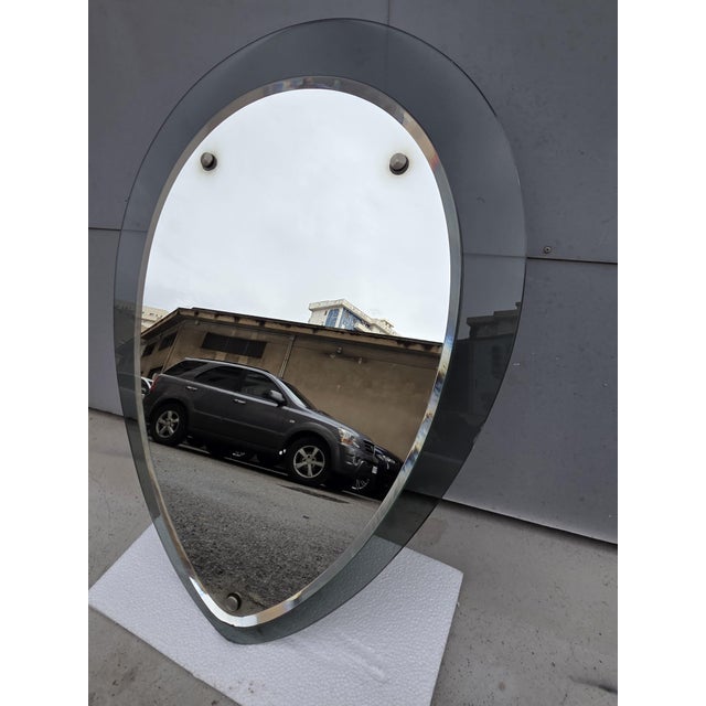 Italian Drop-Shaped Mirror from Veca, 1970s, in Very Good conditions. Designed 1970 to 1979 This piece is attributed to...