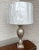 High quality neoclassical urn shaped table lamp with beautiful warm silver painted finish. Lamp measures 30" to top of...