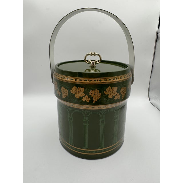 This stunning Mid-Century Modern ice bucket by Cera is a quintessential example of Hollywood Regency barware from the...
