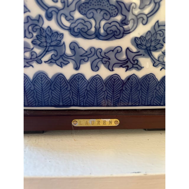 Ralph Lauren small blue and white chinoserie table lamp. No shade. 9" wide, 7" deep, 17" to top of finial.