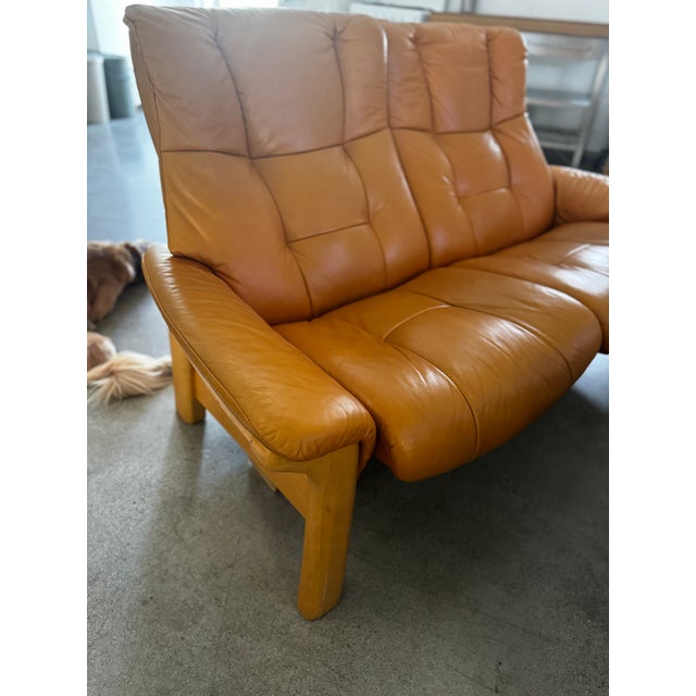 Norwegian Tan Leather Stressless Reclining Sofa Model: Windsor High back Loveseat All Seats recline and feature a...