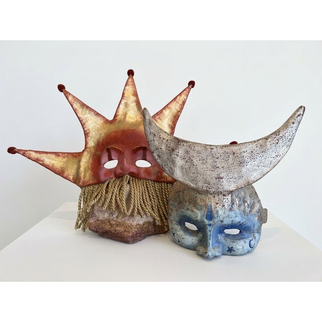Post-1950 Handmade matching pair of Venetian-style celestial masks, representing the Sun (Sole) and the Moon (Luna)....