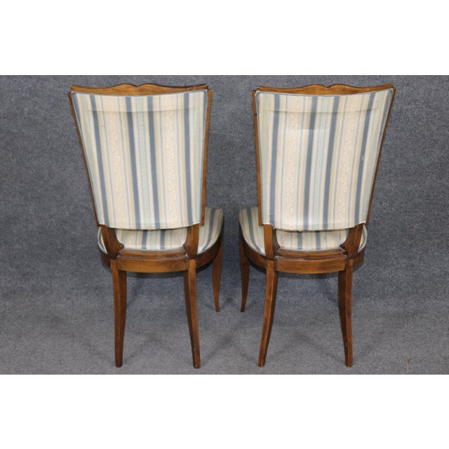 Dimensions: 39.75 inches High x 17.75 inches wide x 21.25 inches deep. Seat height 19.5 inches A refined and...