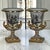 Striking and exquisite, this rare pair of Ritzenhoff & Breker porcelain mantel urns celebrates the elegance and romance of...