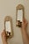 Made in Sweden. A stunning pair of mid-century hand crafted hammered heavy brass sconces with mirror. Despite their age,...