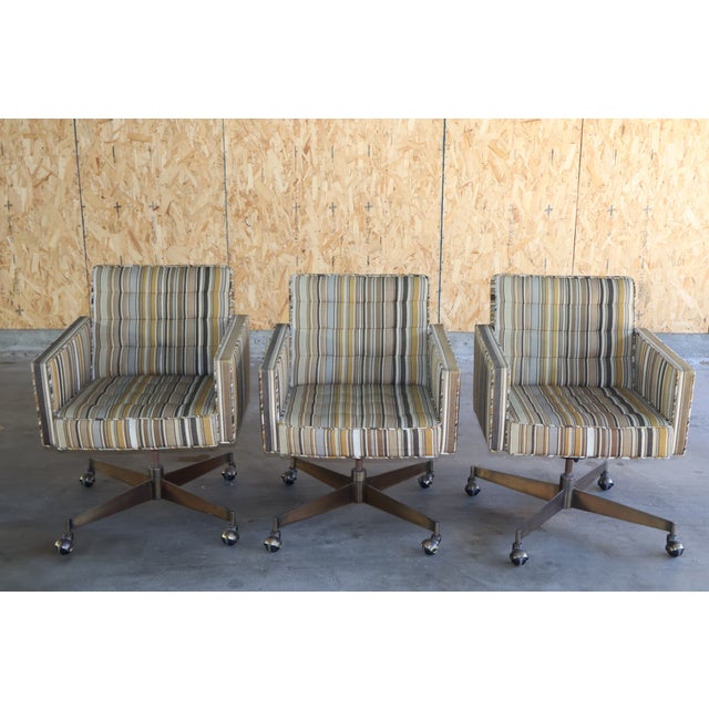 Vintage swiveling and reclining executive office chairs by Edward Wormley for Dunbar. Three chairs available, sold...