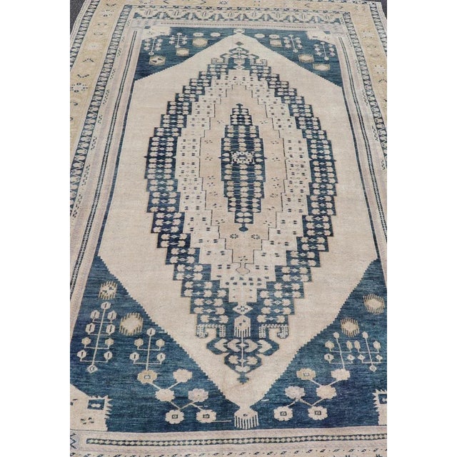 Vintage Oushak Rug with Blue and Beige Measures: 6'4" X13' Elegant Vintage Turkish Oushak Rug with Intricate Blue and...