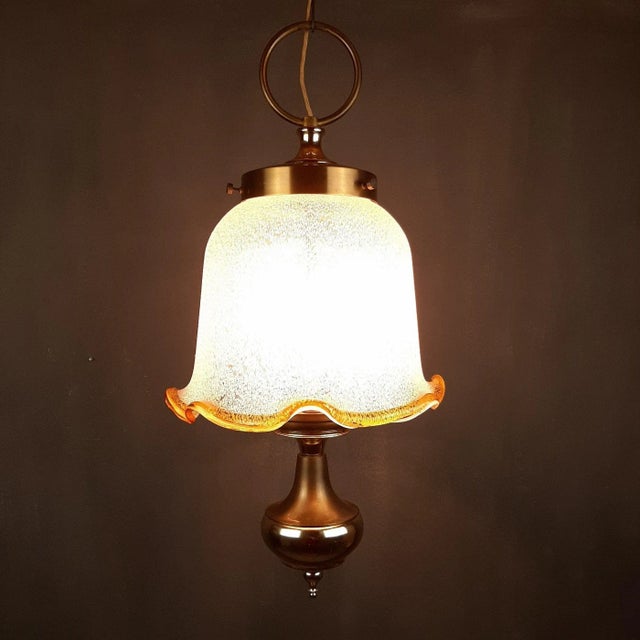 Unusually beautiful Murano glass chandelier made in Italy in the 1980s. It will undoubtedly decorate your home. In...