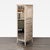 This Arhaus dresser features a tall, slim design with a light wood finish. It has five spacious drawers for ample storage...