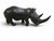 Exceptional hand-carved rhinoceros sculpture executed in serpentine stone by the Zimbabwean artist Lamelik, created during...