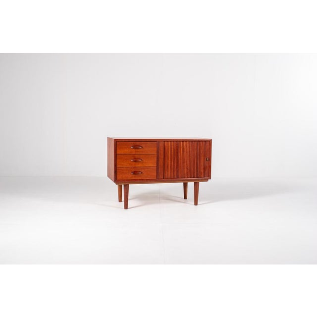 Beautiful Danish teak sideboard from the mid century period. Made of warm teak wood with a rich color and beautiful...