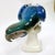 This striking Mid-Century Modern porcelain figurine showcases a majestic Blue Macaw parrot, masterfully crafted by the...