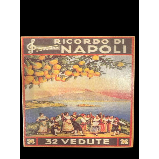 The colorful cover, featuring images of oranges, lemons, the bay of Naples, and Mount Vesuvius, is characteristic of these...